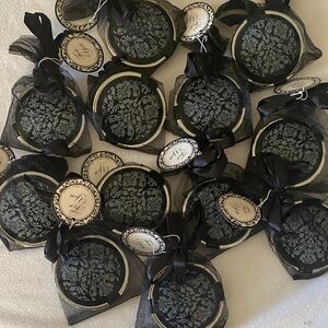 12 little compact party favors with a mirror inside